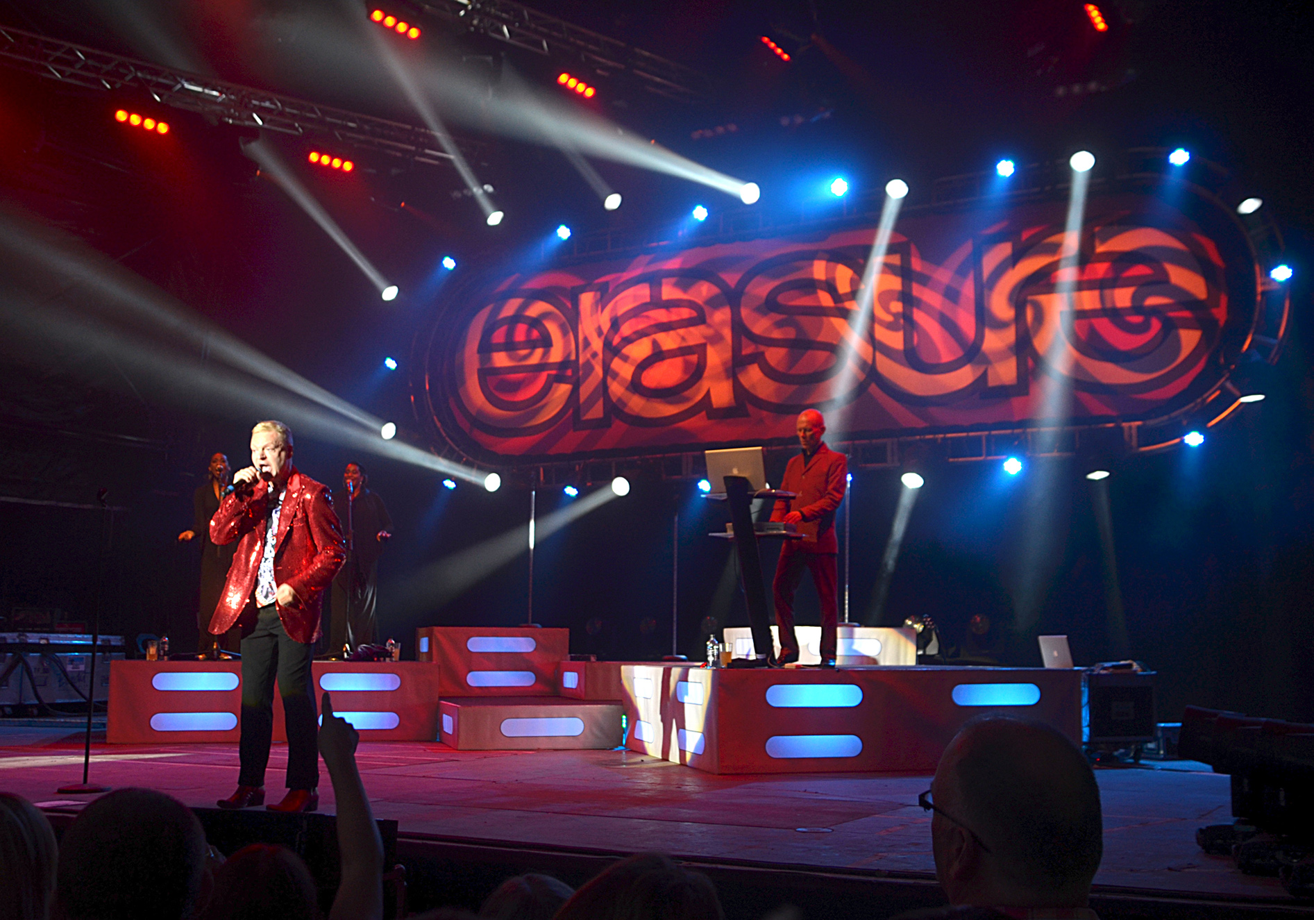 Andy Bell and Vince Clarke performing beneath the Erasure stage backdrop at Delamere Forest in 2011